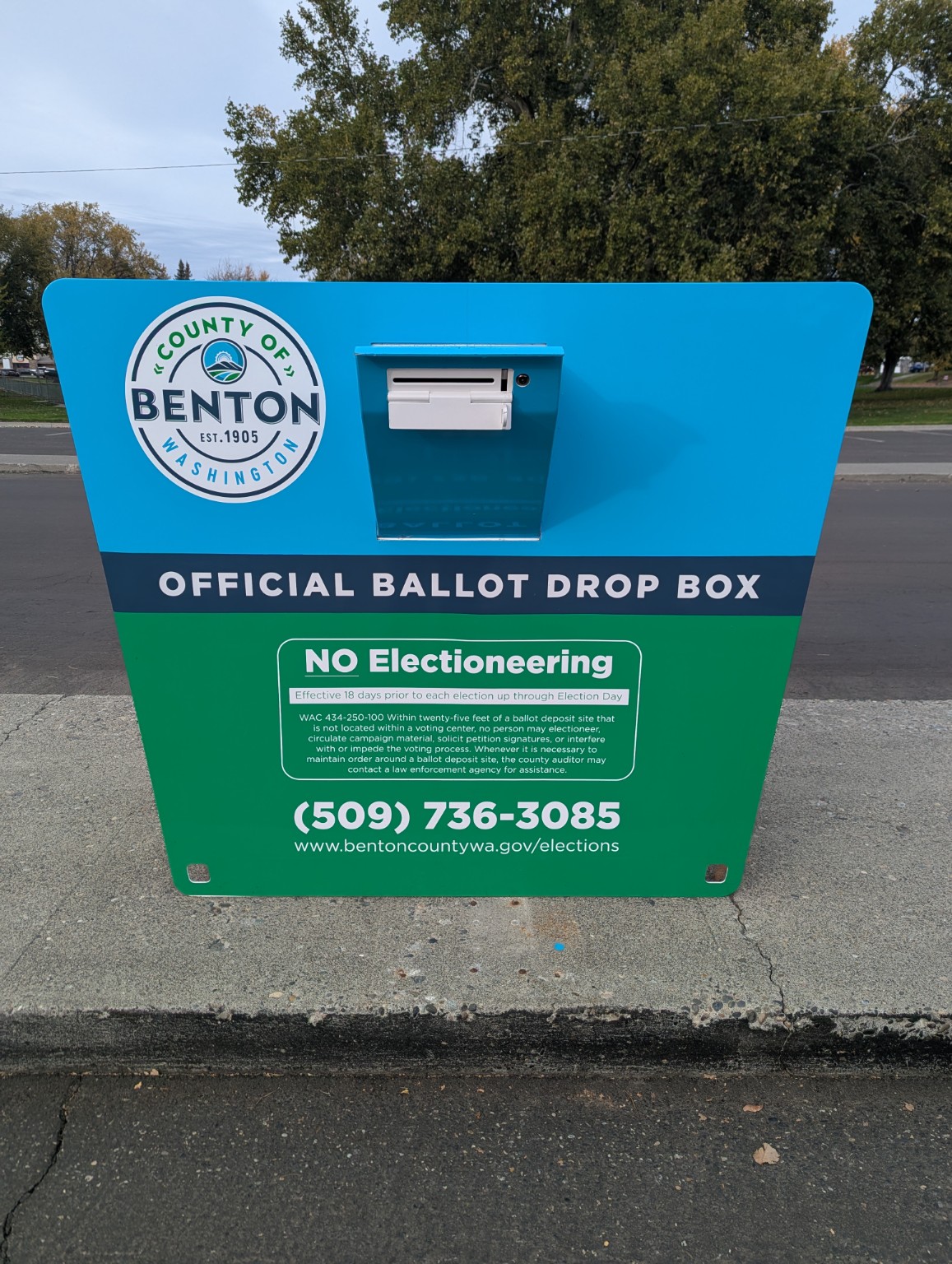 Benton County blue and green ballot drop box graphics